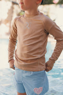 Lycra pour garçons Natif, bleu et marron, avec un indice UPF 50% pour rester au soleil et dans l'eau en toute sécurité