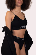 Sous-vêtements tanga pour femme Natif pixel, en nylon avec ses coeurs et fleurs, couleur noir avec un style surf et décontracte