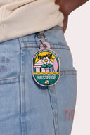 Porte-clés Natif Hossegor avec des fleurs et planches de surf en couleur rose et vert