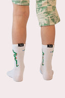 Chaussettes enfant Natif snake tatoos avec son serpent stylé, couleur blanc en coton, pour avoir le style Natif jusqu'aux pieds.
