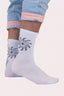 Chaussettes Natif tatoos avec des coeurs, soleils et flammes, couleur blanc en coton, pour avoir le style Natif jusqu'aux pieds.