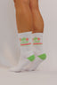 Chaussettes blanche verte et rouge de la marque Natif pour un style skate et surf