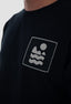 T-shirt noir des Mèdes à Porquerolles, broderie avec étiquette personnalisée, en coton bio pour homme et femme.