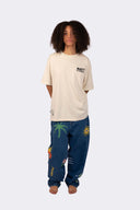 T-shirt unisexe Natif Elements, coton bio et col rond, couleur crème avec des fleurs, soleil et des élèments Natif pour un style connecté à la nature