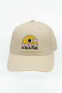 Casquette crème avec un oeil de la marque Natif en collaboration avec Kbane