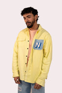 Veste Jaune en velours côtelé, poche en denim bleu, design Natif N pour un style des années 90s