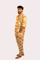 Pantalon fluide pattern pour homme avec des motifs de soleil et fleurs dans le style surf de la marque de vêtements Natif