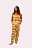 Corp fluide pattern pour femme avec des motifs de soleil et fleurs dans le style surf de la marque de vêtements Natif