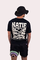 T-shirt natif new Porquerolles noir porté par un homme
