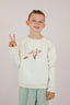 Sweat coton bio pour enfant, col rond et couleur crème, avec un style good vibes et floral, broderie de fleur en violet