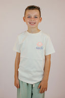 T-shirt enfant good vibes en coton bio et col rond, couleur crème avec des fleurs et des broderies ultra colorées de la marque de vêtements Natif