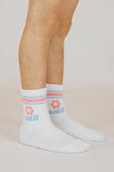 Paire de chaussettes blanche en coton blanc avec des fleurs et un style good vibes de la marque de vêtements Natif