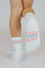 Chaussettes blanche en coton avec la mention feel good in your socks