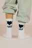 Chaussettes blanche avec des coeurs et des fleurs au style good vibes de la marque de vêtements Natif et en coton