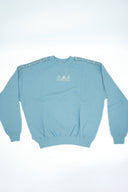 Sweat Natif surf legend de couleur bleu avec broderei sur la manche