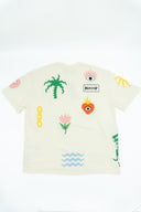 T-shirt Natif blanc avec des symboles de tatouage brodés.