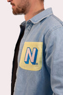 Veste bleu en denim jean, design Natif N pour un style des années 90s