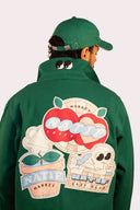 Veste verte avec des patch de fleurs, good vibes et Natif, coton bio pour homme et femme.