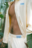 Ensemble en velours côtelé Natif good vibes, pantalon et veste, couleur crème pour un été cool et décontracte.
