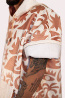 Poncho pour homme et femme couleur beige et crème au style surf avec capuche de la marque de vêtements Natif