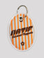 Porte clé natif saint tropez de couleur orange et bleu
