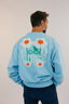 Sweat bleu good vibes de la marque Natif avec ses fleurs et son style décontracte