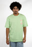 T-shirt natif good vibes porté une femme avec une fleur et des couleurs VERT, et violet en coton avec col rond