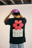 T-shirt noir Natif Crew avec sa fleur rouge au dos pour un style good vibes